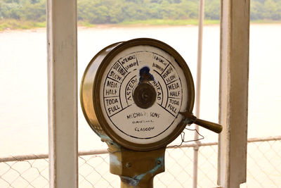 Close-up of clock on wall