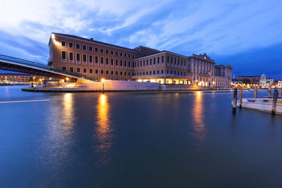 Reflection of illuminated buildings in water