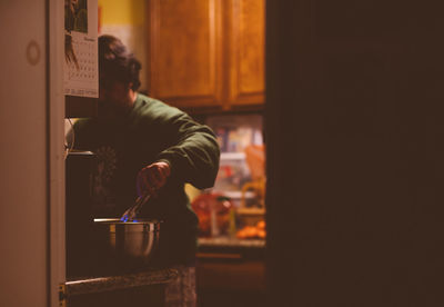 Close-up of man in kitchen