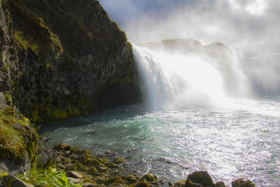 Peaceful scene at godafoss in the north of iceland on a lightly overcast summer day