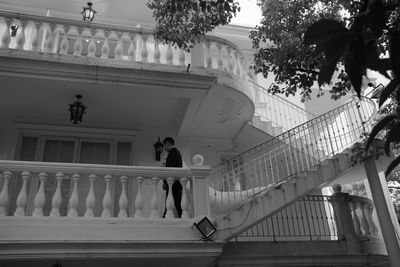 Low angle view of people walking on steps