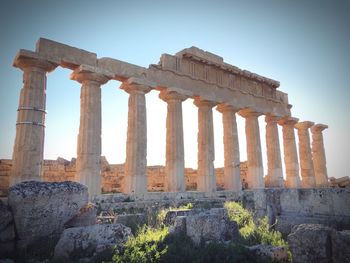 Ruins of historical building against sky