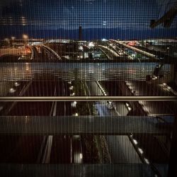 High angle view of bridge in city at night