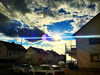 Houses against sky in city