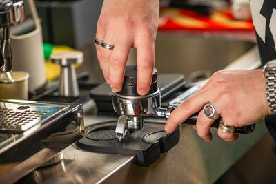 Midsection of man working at gym