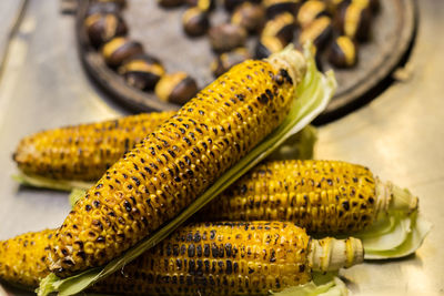 Close-up of corns on table