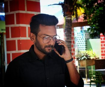 Young man using mobile phone