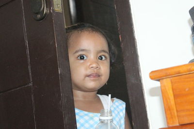 Portrait of smiling girl looking away