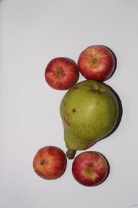Directly above shot of apples against white background