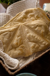 High angle view of bread in basket on table