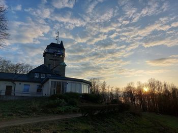 Exterior of building against sky during sunset