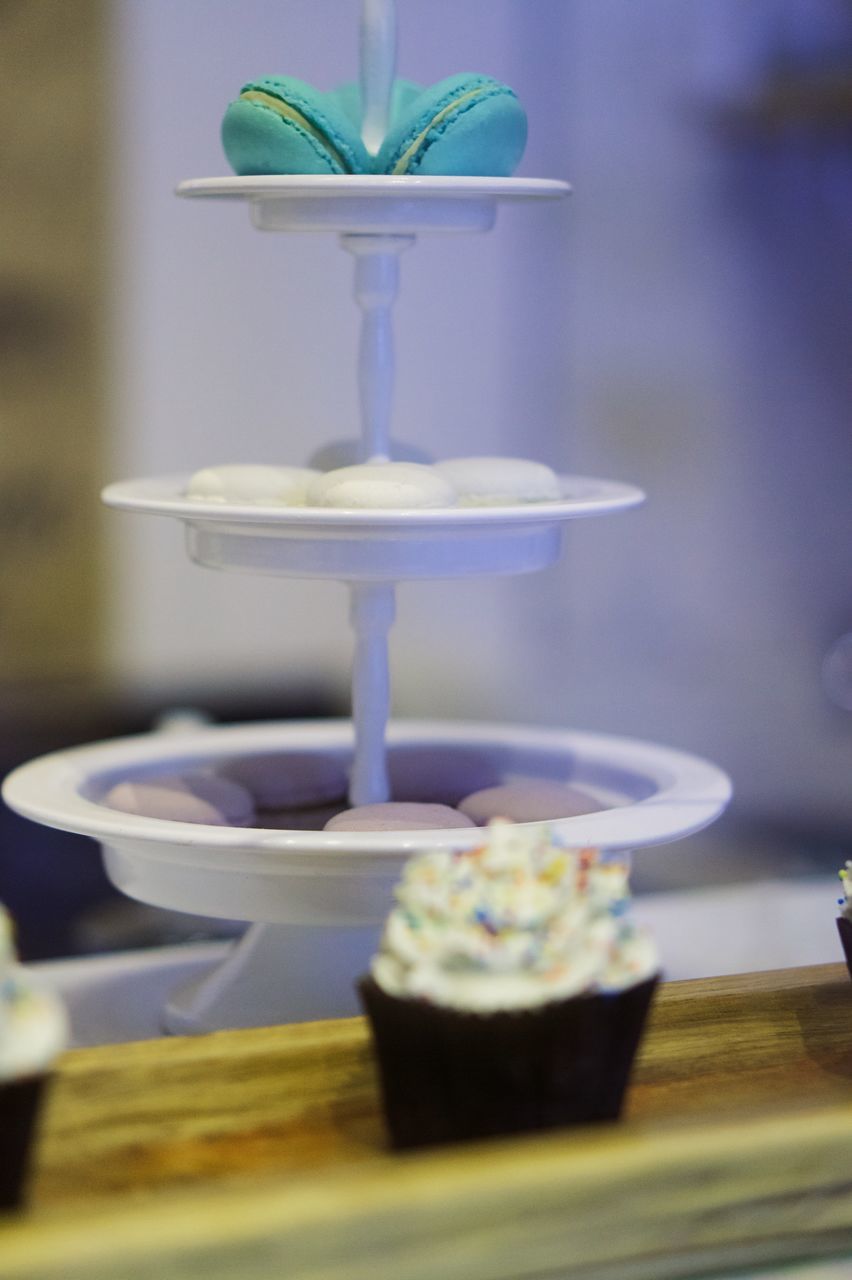 CLOSE-UP OF CAKE SLICE IN PLATE ON TABLE