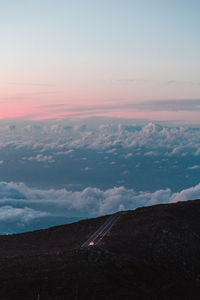 Scenic view of landscape against sky during sunset