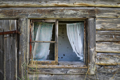 Window of old abandoned building