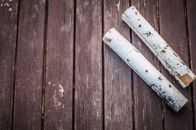 High angle view of wooden plank on table