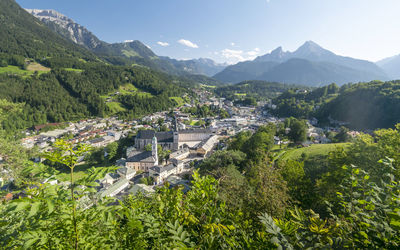 High angle view of trees and buildings against sky