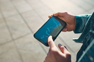 High angle view of person using mobile phone