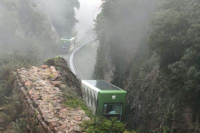 Scenic view of mountains in foggy weather