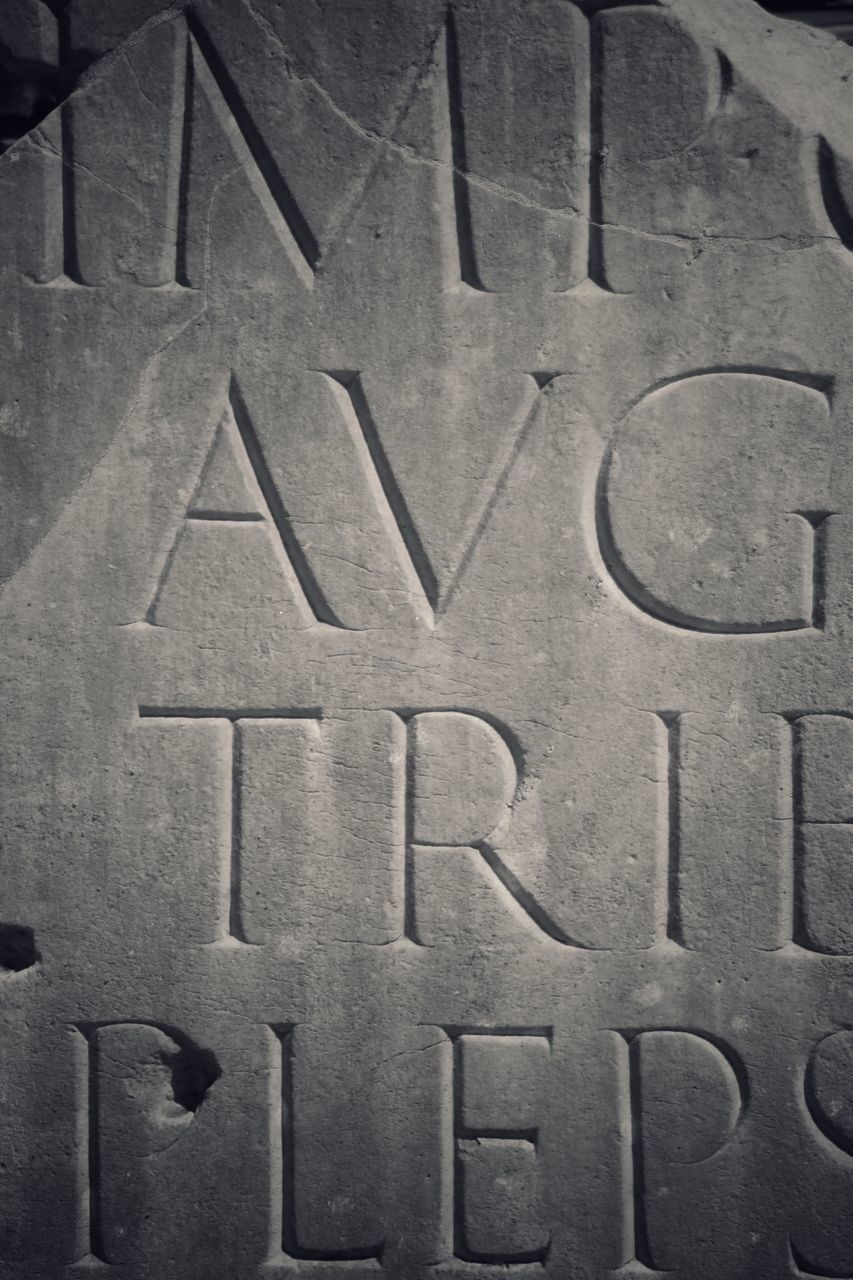 tread, monochrome, font, black and white, no people, monochrome photography, text, backgrounds, full frame, number, close-up, pattern, communication, circle, cemetery, tire, indoors, western script, automotive tire, black
