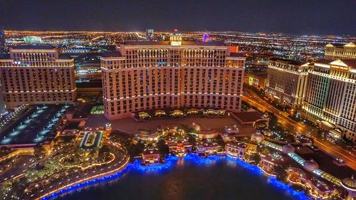 High angle view of illuminated buildings in city