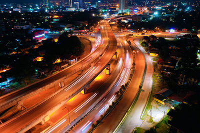 High angle view of light trails on city street