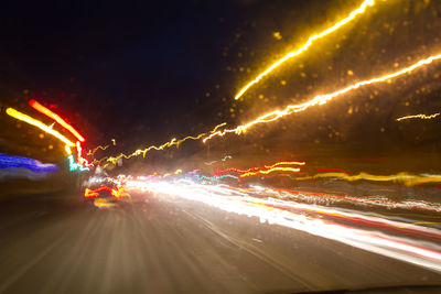 Light trails on road at night