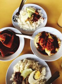 High angle view of breakfast served on table