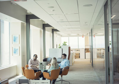 Business people sitting at meeting table