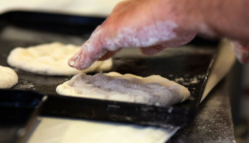 Production of baked bread in a bakery. 