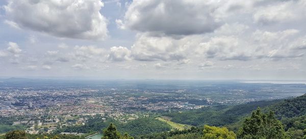 Aerial view of townscape against sky