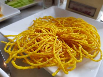 High angle view of pasta in plate on table