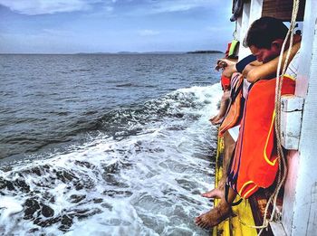 People on boat in sea