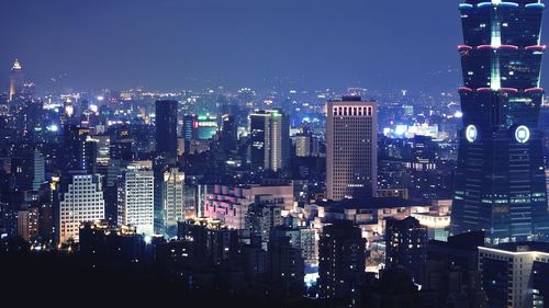 Illuminated cityscape at night