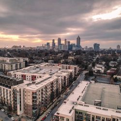 Cityscape against sky during sunset