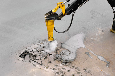 Low section of man working at construction site