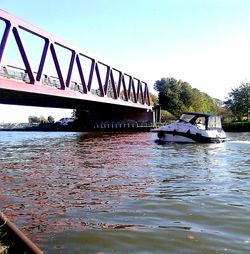 Bridge over river against clear sky