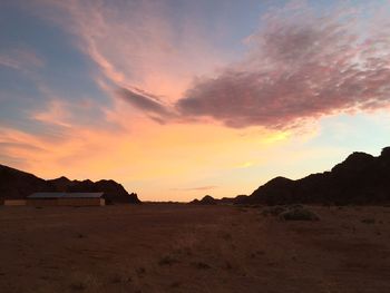 Scenic view of landscape against sky during sunset