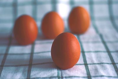 Close-up of oranges on table