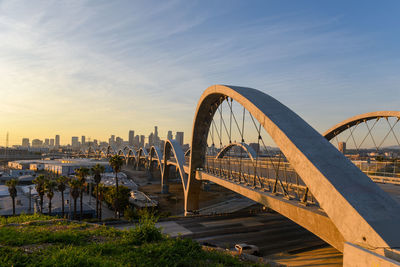 A view of downtown los angeles from the other side of the 6th street bridge. 