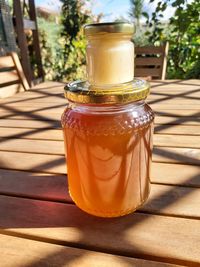 Close-up of drink in glass jar on table