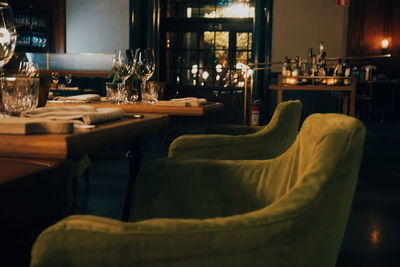 Empty chairs and table in restaurant