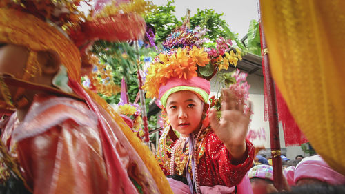 Portrait of boy in traditional costume during festival