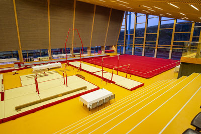 High angle view of multi colored chairs against building