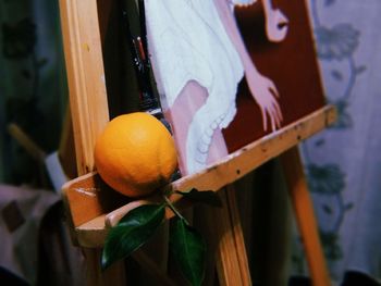 Close-up of orange fruits on wood