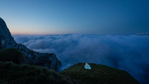 Scenic view of mountain against sky at sunset