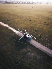 High angle view of airplane flying over land