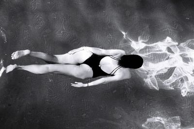 Woman swimming in pool