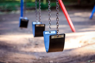 Close-up of swing in park