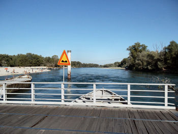 Scenic view of calm sea against clear sky