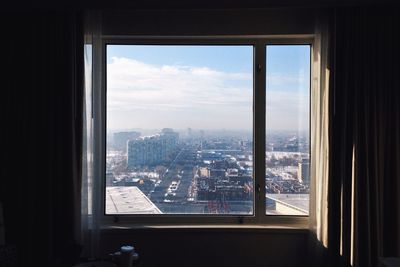 Cityscape seen through window